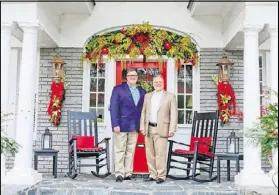  ??  ?? Homeowners Joey Kendrick and Bill Gandee in front of their Virginia Highland home.