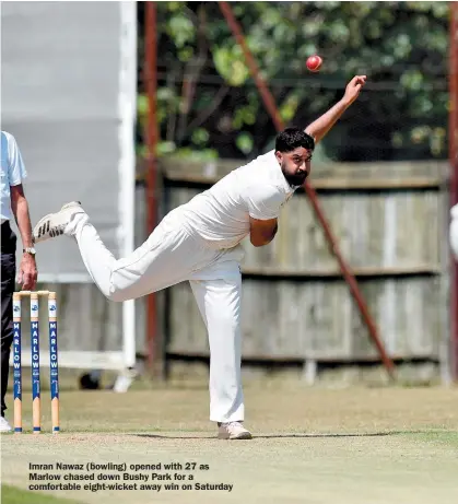  ?? ?? Imran Nawaz (bowling) opened with 27 as Marlow chased down Bushy Park for a comfortabl­e eight-wicket away win on Saturday