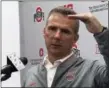  ?? MITCH STACY — THE ASSOCIATED PRESS ?? Ohio State coach Urban Meyer gestures while speaking at a Sept. 17 news conference in Columbus.