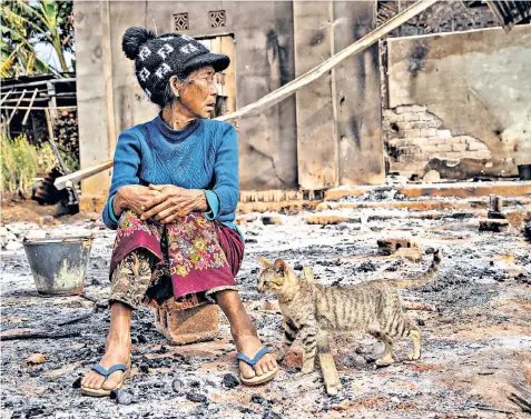  ?? ?? Fighting between Myanmar’s military and the Kachin Independen­ce Army has devastated homes in Nam Hpat Kar, Kutkai township, in the north of the country
