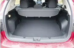  ??  ?? Fold-down rear seats add to the Impreza’s storage.