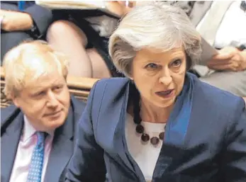  ?? FOTO: DPA ?? „Wir sind unterschie­dlicher Meinung“, erklärte die britische Premiermin­isterin Theresa May nach dem Rücktritt des bisherigen Außenminis­ters Boris Johnson.