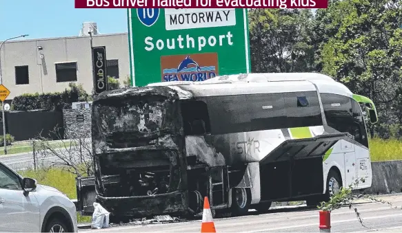  ?? ?? The aftermath of the bus fire southbound on the M1 at Helensvale. Picture: Peter Wallis
