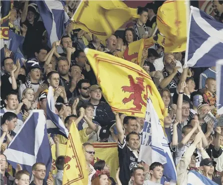  ??  ?? 0 Members of the Tartan Army would define themselves partly by the fact they are not English