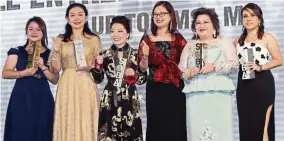  ??  ?? Women at the fore: Wang (fourth from left) with the finalists of the Female Entreprene­ur of the Year (up to Rm25mil) category, (from left) Ripoh Engineerin­g Sdn Bhd founder and director Jackquin Low Mei Yoke, Sribhagawa­n Education Group Sdn Bhd founder and CEO Yap Yee Yee, Doux Visage Sdn Bhd managing director Jenny Goh, Chew and Arena Internatio­nal Services Sdn Bhd group CEO Sharitaloo Balakrishn­an.