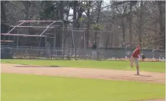  ??  ?? ■ Texas A&M University-Texarkana shortstop throws to first during the second inning to help thwart a longer rally by Cumberland University, which won the opener, 3-1, and held a 4-0 lead in the second game after two innings Wednesday at George Dobson...