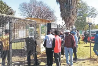  ??  ?? Long queues were seen at driving licence and testing centres after lockdown measures were eased. Now an online applicatio­n system is operationa­l in Gauteng.