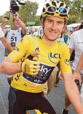  ?? REUTERS PIC ?? Team Sky rider Geraint Thomas celebrates after winning the Tour de France in Paris on Sunday.