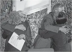  ?? — AFP photo ?? People hug each other after having a moment of silence for the victims of Ethiopia Airline crash before the 4th UN Environmen­t Assembly.