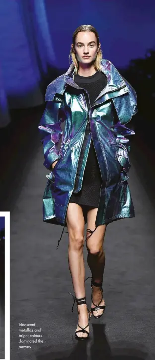  ??  ?? Iridescent metallics and bright colours dominated the runway