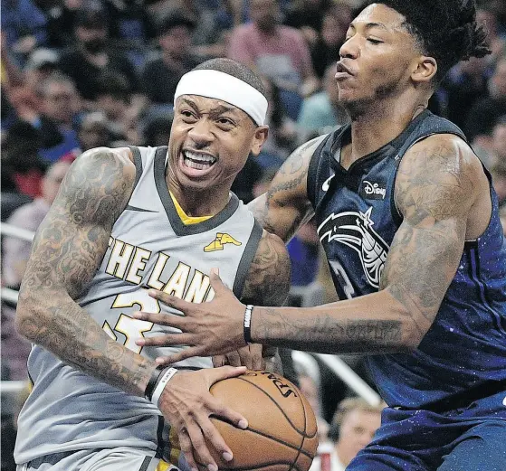  ?? PHELAN M. EBENHACK / THE ASSOCIATED PRESS ?? The Cleveland Cavaliers remade their roster Thursday dealing away six players including guard Isaiah Thomas, left.