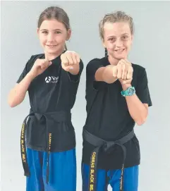  ??  ?? FIGHTING FIT: Black belt students Bella Rosinni and Khloe Theron.