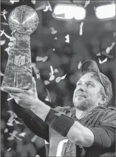  ?? AP PHOTO ?? Philadelph­ia Eagles’ Nick Foles holds up the Vince Lombardi Trophy after winning Super Bowl 52 over the New England Patriots Sunday in Minneapoli­s.