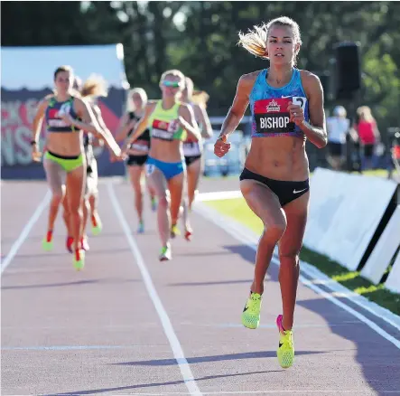  ?? — CP ?? Melissa Bishop of Eganville, Ont., crosses the finish well ahead of the rest of the field to win gold in the women’s 800 metres at the Canadian Track and Field Championsh­ips in Ottawa on Saturday.