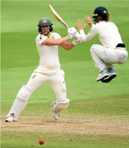  ?? GETTY IMAGES ?? Ellyse Perry has England’s Amy Jones jumping out of the way during the outstandin­g Australian allrounder’s triumphant Ashes series.