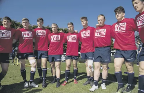  ??  ?? 0 Players from Scotland’s Under-20 squad show support for the UK Anti-doping Agency’s Clean Sport Week at training yesterday.