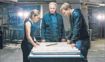  ?? Melinda Sue Gordon
Paramount Pictures ?? EMILIA CLARKE, Arnold Schwarzene­gger and Jai Courtney in “Terminator Genisys,” out Wednesday.