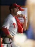  ?? BRYNN ANDERSON — THE ASSOCIATED PRESS ?? Phillies manager Gabe Kapler blows a bubble in the dugout during the first inning.