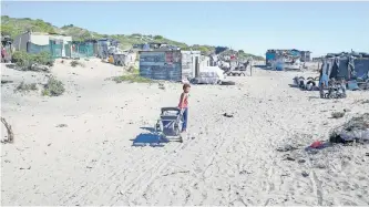  ?? Independen­t Newspapers ?? REALITY Village, an informal settlement in Tafelsig, Mitchells Plain, is involved in an interim interdict matter with the City of Cape Town.
LEON LESTRADE