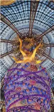  ?? PASCAL LE SEGRETAIN/Getty Images ?? The interior of Galeries Lafayette
in Paris is worth a look.