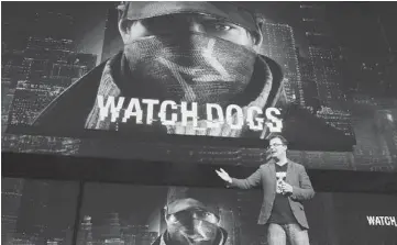  ??  ?? LATEST WATCH DOG: Morin, the creative director at Ubisoft presents Ubisoft’s latest game developmen­t “Watch Dog”, as Sony introduces the PlayStatio­n 4 at a news conference on Feb 20 in New York.
