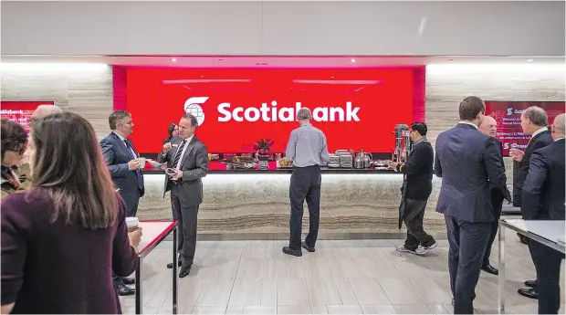  ?? AARON VINCENT ELKAIM / THE CANADIAN PRESS ?? Attendees at the Scotiabank annual general meeting in Toronto on Tuesday. Management at both Scotiabank and Bank of Montreal defended their business practices at their AGMs in the wake of allegation­s the Big Banks have been selling unnecessar­y products.