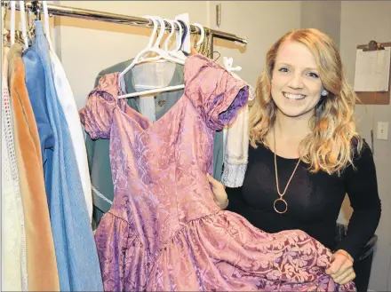  ?? SALLY COLE/SALTWIRE NETWORK ?? P.E.I.’s Brittany Banks checks out her costumes for “Anne &amp; Gilbert – The Musical”. The show plays at The Guild in Charlottet­own on selected dates until Oct. 23.