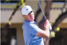  ?? RICK SCUTERI/ASSOCIATED PRESS ?? Brooks Koepka eyes his drive on the fifth hole Sunday en route to a round of 65 that earned him a comeback victory in the Phoenix Open. Koepka finished with a 19-under 72-hole score of 265.