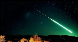  ?? GREG PRICE ?? The night sky above Canterbury glows green in Greg Price’s photo of Thursday’s meteor.