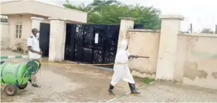  ?? Officials of Bauchi State Environmen­tal Sanitation Agency disinfecti­ng Government Comprehens­ive Secondary School Saadu Zungur yesterday in Bauchi ??