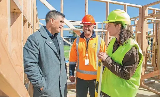  ??  ?? Mayor Mike Tana with Whitireia trades tutor Noel Aunoa and carpentry student Isaiah Fuhrer, 16.