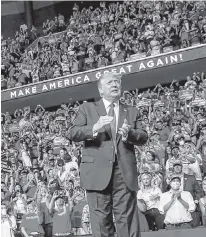  ?? REUTERS ?? U.S. President Donald Trump reacts to the crowd as he arrives onstage at his first re-election cam-paign rally in several months in the midst of the coronaviru­s disease outbreak, at the BOK Center in Tulsa, Ok. on June 20.