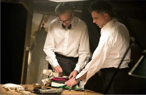  ?? Phantom Thread. ?? Actor Daniel Day-Lewis (left) discusses a scene with writer/director Paul Thomas Anderson on the set of their latest collaborat­ion,