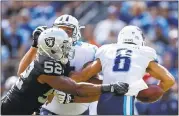  ?? WESLEY HITT — GETTY IMAGES ?? The Raiders’ Khalil Mack, going after the Titans’ Marcus Mariota on Sunday, was graded out as the league’s best edge player by Pro Football Focus for Week 1.