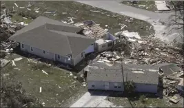  ?? The Associated Press ?? Debris from homes destroyed by Hurricane Michael litters the ground on Thursday in Mexico Beach, Fla.