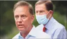  ?? John Minchillo / Associated Press ?? Gov. Ned Lamont will begin suspension­s Friday for state employees who do not get vaccinated or agree to weekly COVID testing.