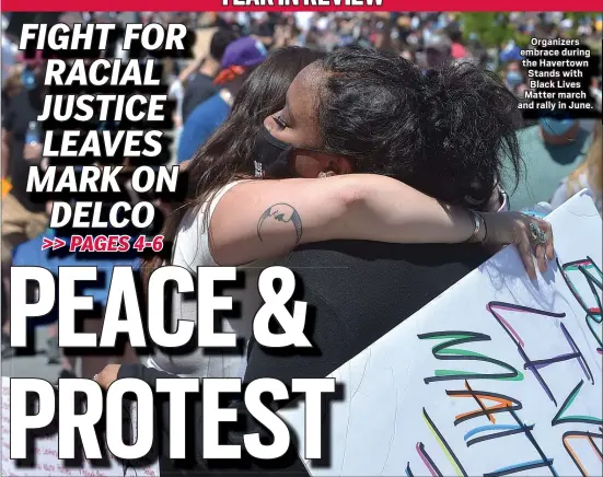  ?? PETE BANNAN - MEDIANEWS GROUP ?? Organizers embrace during the Havertown Stands with Black Lives Matter march and rally in June.