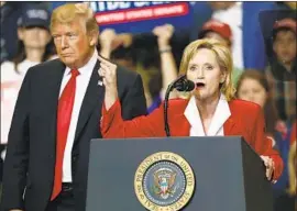  ?? Rogelio V. Solis Associated Press ?? PRESIDENT TRUMP may have helped boost Sen. Cindy Hyde-Smith to victory.