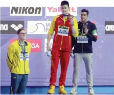  ?? GETTY ?? Il rifiuto di Horton a salire sul podio con Sun Yang ai Mondiali 2019