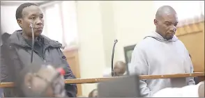  ?? (Pic: Times Live) ?? Nqobile Ndlovu and Mthunzi Zulu appeared at the Protea Magistrate­s Court facing two counts of murder.