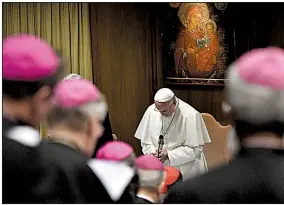  ?? AP/VINCENZO PINTO ?? Pope Francis prays Thursday at the Vatican as he opens a summit on sexual abuse by clerics. “Hear the cry of the little ones who plead for justice,” Francis said, setting a firm tone for the four-day meeting.