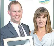  ??  ?? David and Naomi Matchett of Best Match Recruitmen­t after the company was named the 2014 Baw Baw Shire Business of the Year.