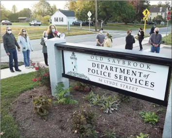  ?? Arnold Gold / Hearst Connecticu­t Media ?? Area residents protest in front of the Old Saybrook Department of Police Services on Oct. 15.