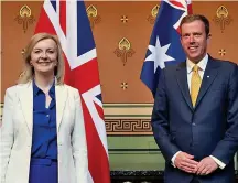  ??  ?? Liz Truss with Australian Trade Minister Dan Tehan in April