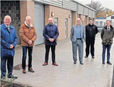  ?? ?? Open day Councillor Ian McNeil and Councillor Allan Graham (far left) visit the new Spruce Court industrial units