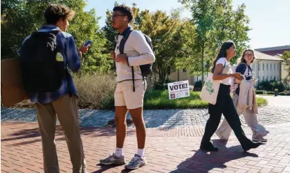  ?? Photograph: Elijah Nouvelage/AFP/Getty Images ?? Huge numbers of young people turned out to vote Democrat.