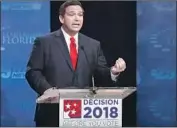  ?? Wilfredo Lee Getty Images ?? REPUBLICAN Rep. Ron DeSantis, Gillum’s opponent, has aligned himself closely with President Trump — who Gillum says should be impeached.