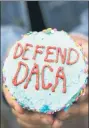  ??  ?? A DACA rally cupcake.