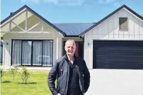  ??  ?? Set to sell . . . The Grange Lifecare Village director Geoff McPhail visits a villa at the $150 million facility in East Taieri.