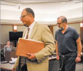  ?? Morgan Lieberman ?? Las Vegas Review-journal Robert Graham, right, with his lawyer Bryan Cox, at a hearing Thursday at the Regional Justice Center. He pleaded guilty to stealing from his clients.